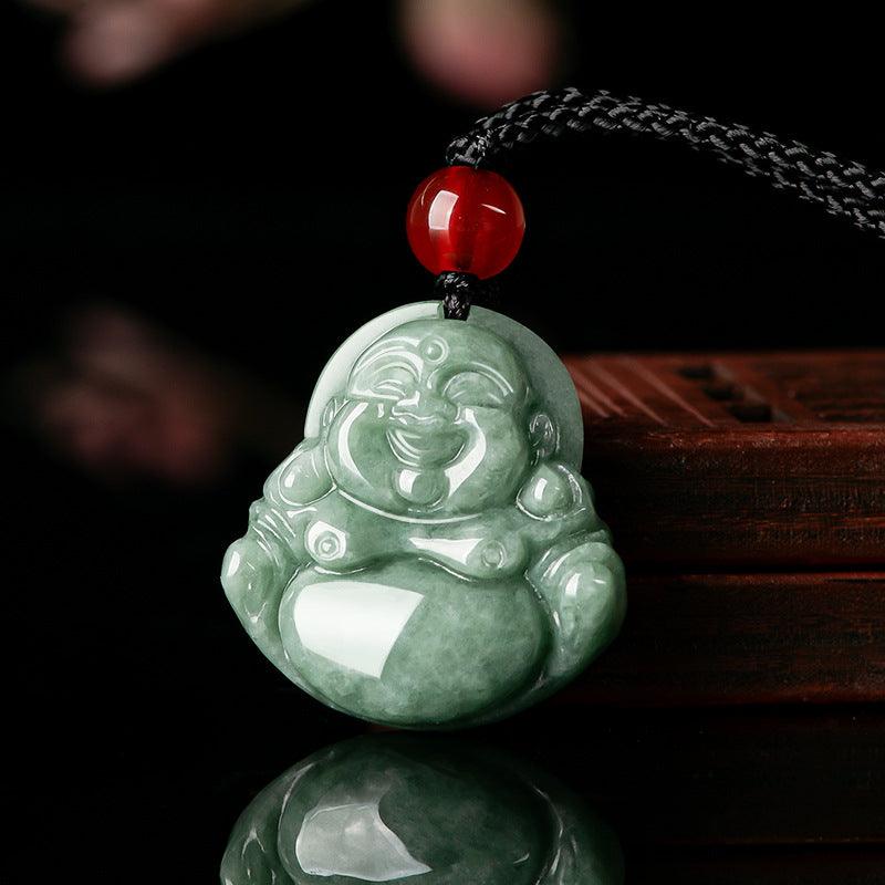 Full view of a jade Maitreya Buddha pendant with a red bead and black cord, symbolizing peace and happiness.